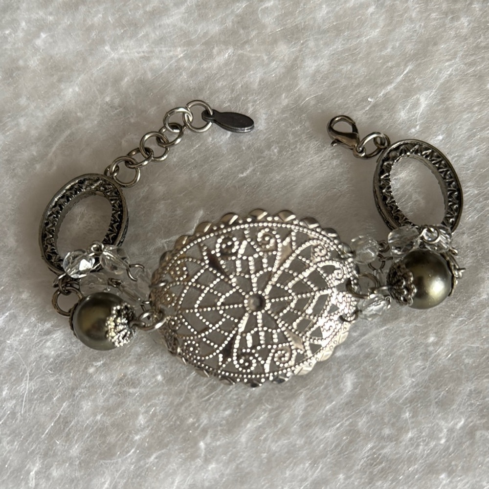 Elegant Silver Bracelet with Intricate Design
